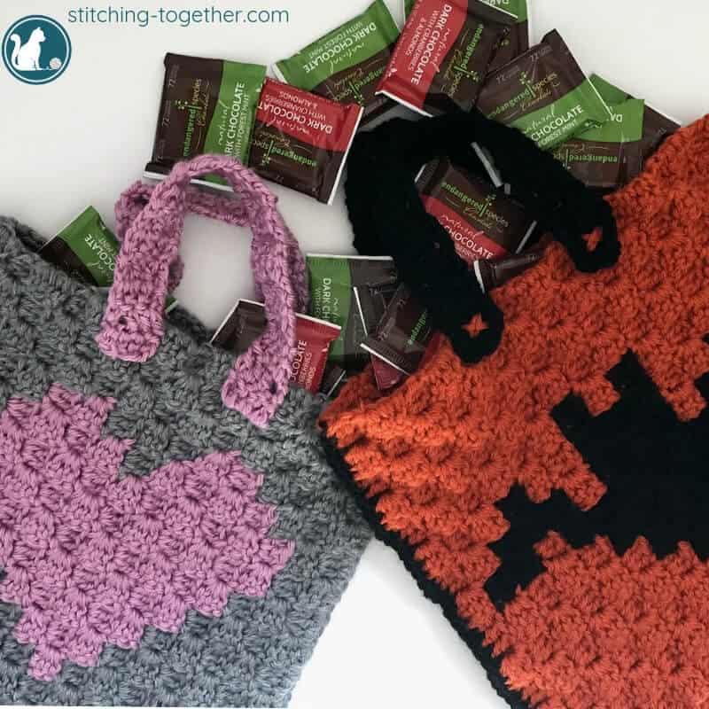 2 crochet trick or treat bags with chocolate