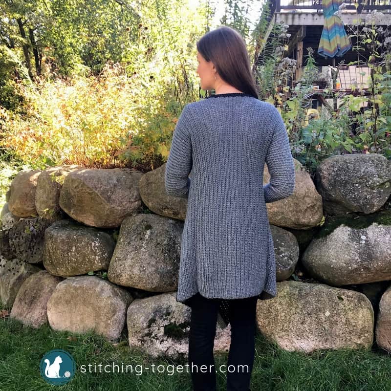 back of gray crochet blanket cardigan