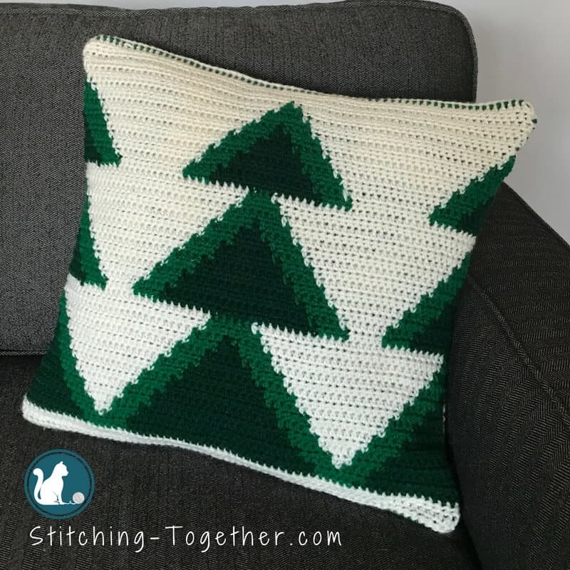 Cute Crochet Christmas Tree pillow cover. Get in the holiday spirit with this free crochet pattern. #RHSS #CrochetChristmas #Christmasdecor