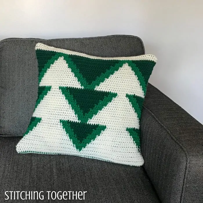 Crochet christmas tree pillow with white trees