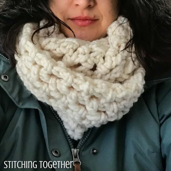 lady wearing an easy crochet infinity scarf
