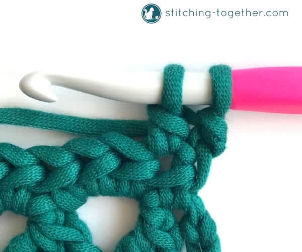 Learn how to crochet the Modified Cluster stitch with this full photo tutorial. The stitch creates adorable triangles which are great for scarves or accessories. 