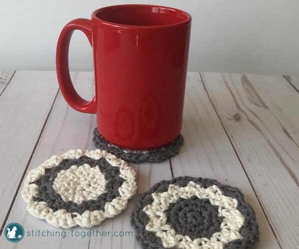 Gray and white crochet round coasters