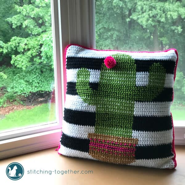 Be on trend with this adorable crochet cactus pillow pattern. This is one of the most fun projects I've done recently! Combining easy crochet stitches with simple cross stitch pattern gives this pillow cover its unique look. Have you noticed that cactus motifs are everywhere this season? Now you can make your own and brighten up your home!