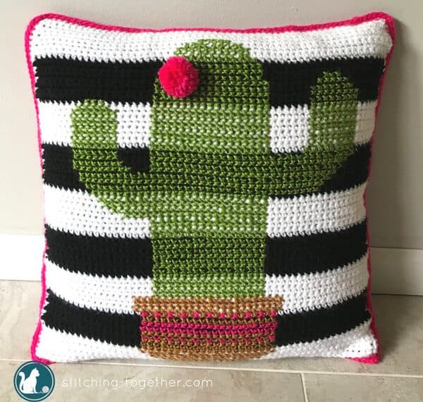 Be on trend with this adorable crochet cactus pillow pattern. This is one of the most fun projects I've done recently! Combining easy crochet stitches with simple cross stitch pattern gives this pillow cover its unique look. Have you noticed that cactus motifs are everywhere this season? Now you can make your own and brighten up your home!