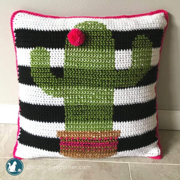 Be on trend with this adorable crochet cactus pillow pattern. This is one of the most fun projects I've done recently! Combining easy crochet stitches with simple cross stitch pattern gives this pillow cover its unique look. Have you noticed that cactus motifs are everywhere this season? Now you can make your own and brighten up your home!