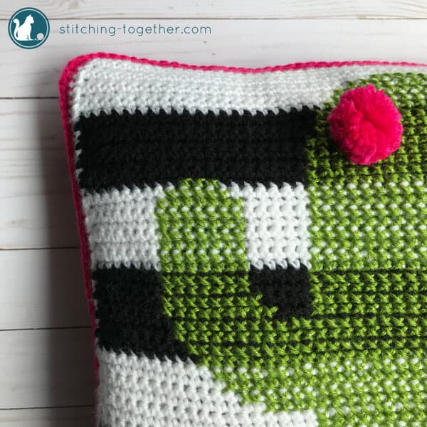 Be on trend with this adorable crochet cactus pillow pattern. This is one of the most fun projects I've done recently! Combining easy crochet stitches with simple cross stitch pattern gives this pillow cover its unique look. Have you noticed that cactus motifs are everywhere this season? Now you can make your own and brighten up your home! 