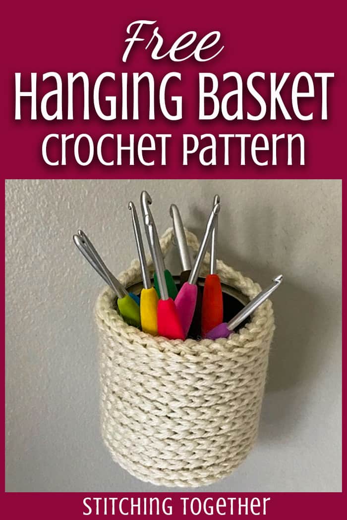 crochet basket hanging with crochet hooks inside