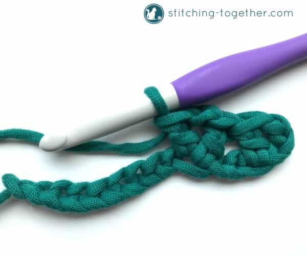 Learn how to crochet the v-stitch with this easy photo tutorial. The tutorial also includes instructions on how to add rows of other stitches on to your v-stitches. The stitch pattern is also known as the open v-stitch or dc v-stitch. What will you make with these stitches?