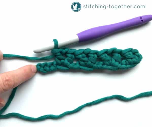Learn how to crochet the v-stitch with this easy photo tutorial. The tutorial also includes instructions on how to add rows of other stitches on to your v-stitches. The stitch pattern is also known as the open v-stitch or dc v-stitch. What will you make with these stitches?