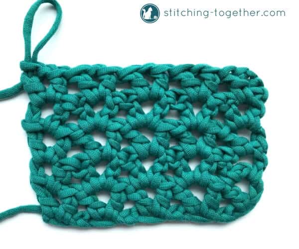 Learn how to crochet the v-stitch with this easy photo tutorial. The tutorial also includes instructions on how to add rows of other stitches on to your v-stitches. The stitch pattern is also known as the open v-stitch or dc v-stitch. What will you make with these stitches?