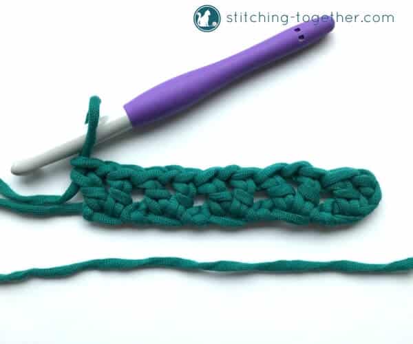 Learn how to crochet the v-stitch with this easy photo tutorial. The tutorial also includes instructions on how to add rows of other stitches on to your v-stitches. The stitch pattern is also known as the open v-stitch or dc v-stitch. What will you make with these stitches?