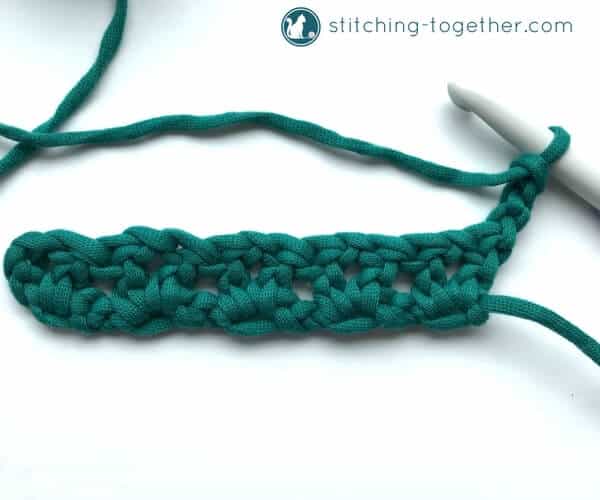 Learn how to crochet the v-stitch with this easy photo tutorial. The tutorial also includes instructions on how to add rows of other stitches on to your v-stitches. The stitch pattern is also known as the open v-stitch or dc v-stitch. What will you make with these stitches?