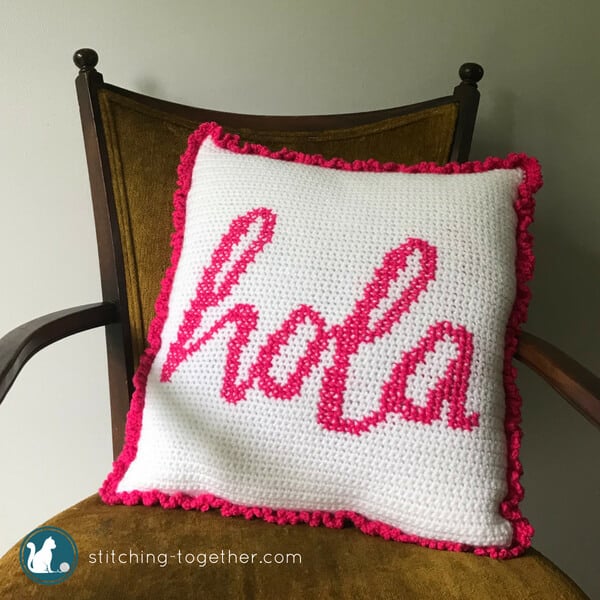 Get your house fiesta ready with this adorable hola crochet pillow pattern. This easy and free crochet pattern combines crochet and cross stitch to make a fun crochet cushion for your couch. Give your pillows a cover that will make them stand out in your living room!