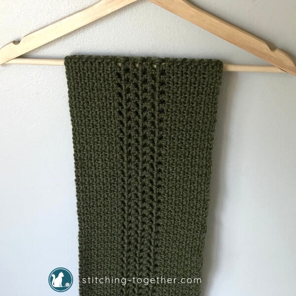 Hanging green crochet scarf