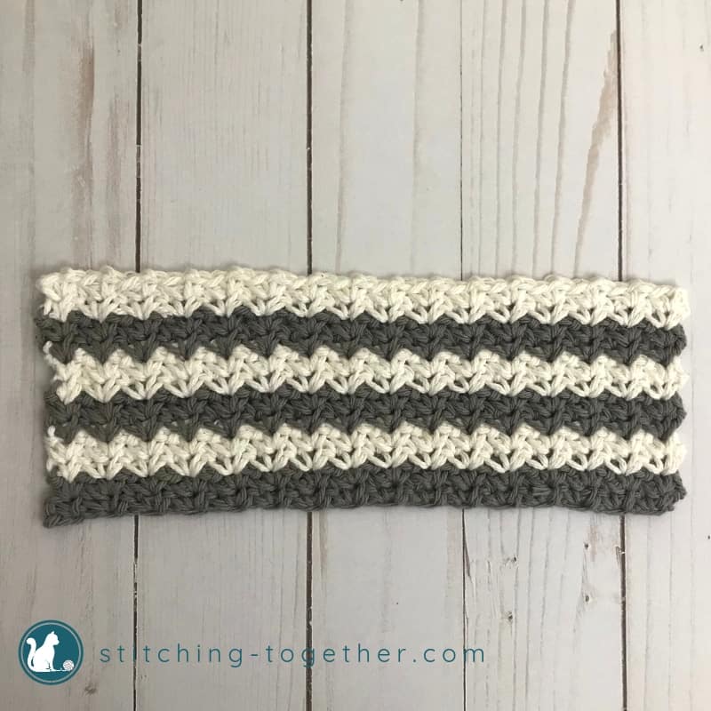 gray and white crochet rectangle