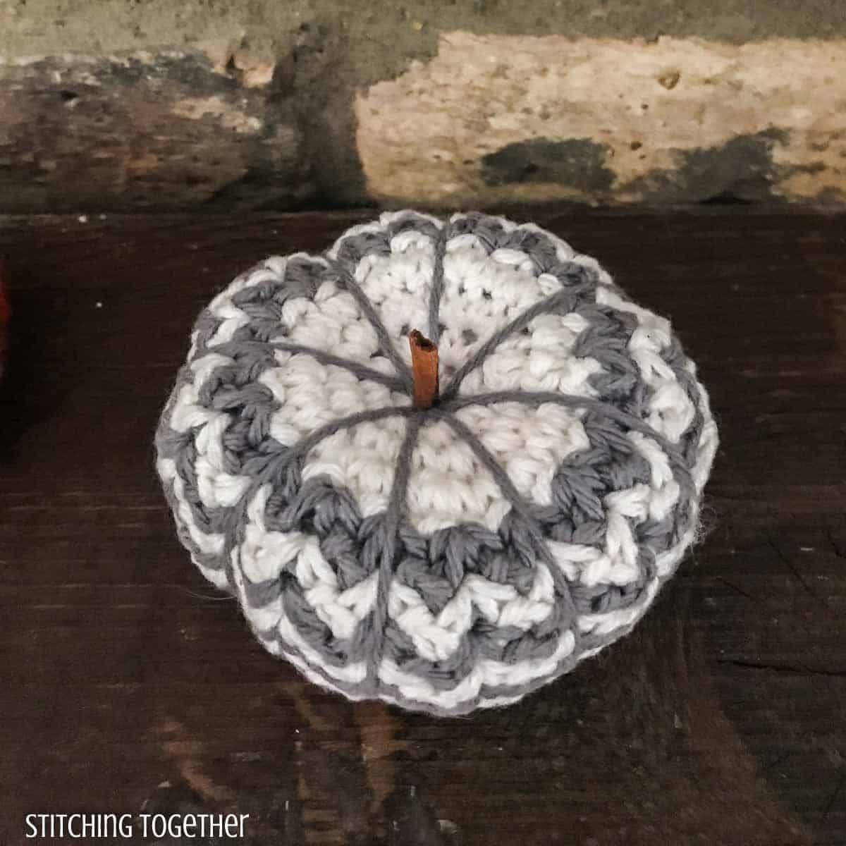 gray and white farmhouse crochet pumpkin
