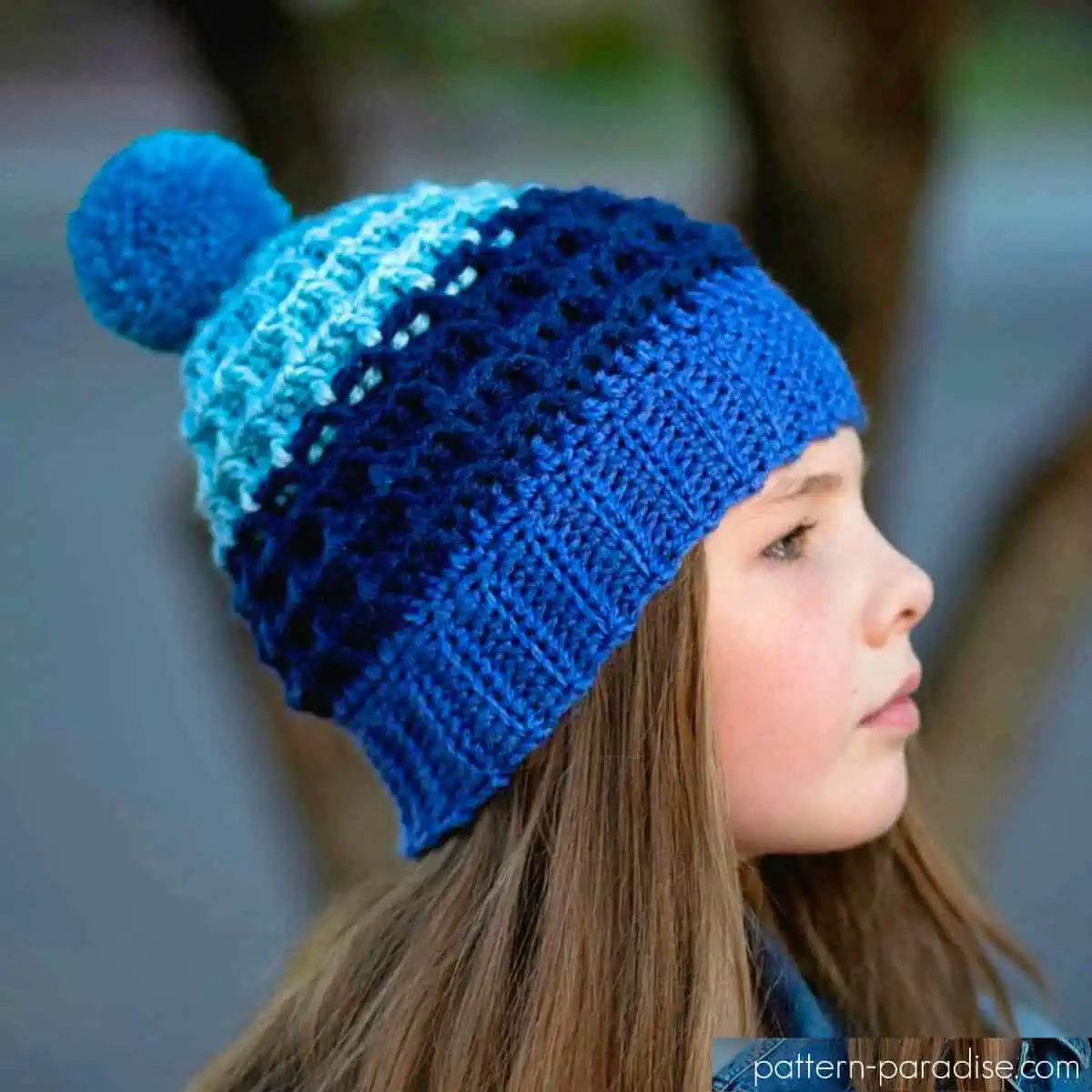 girl wearing blue crochet hat