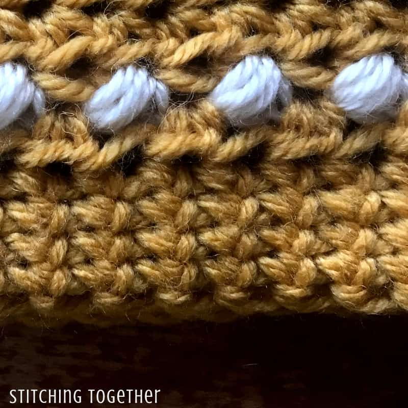 Close up of brim and stitches in the puff stitch hat