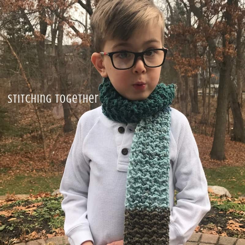 Boy wearing a crochet kids scarf