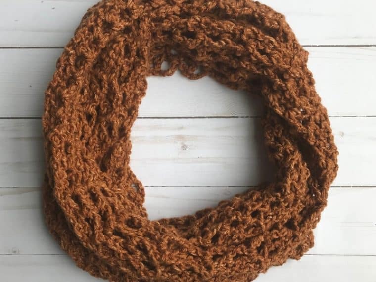 copper colored one skein crochet scarf in a circle
