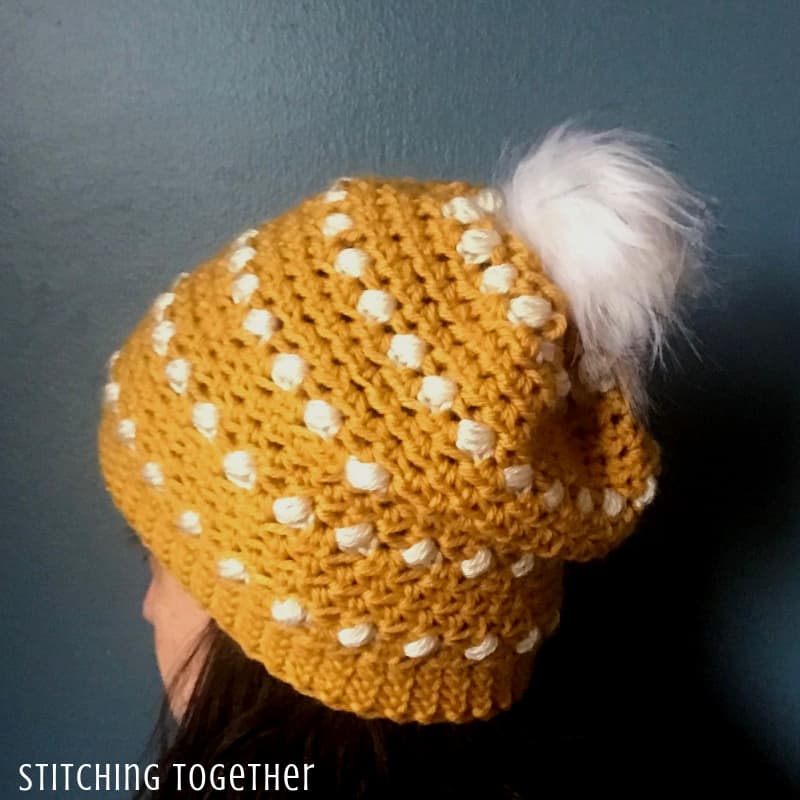 mustard color crochet puff stitch hat hat being worn