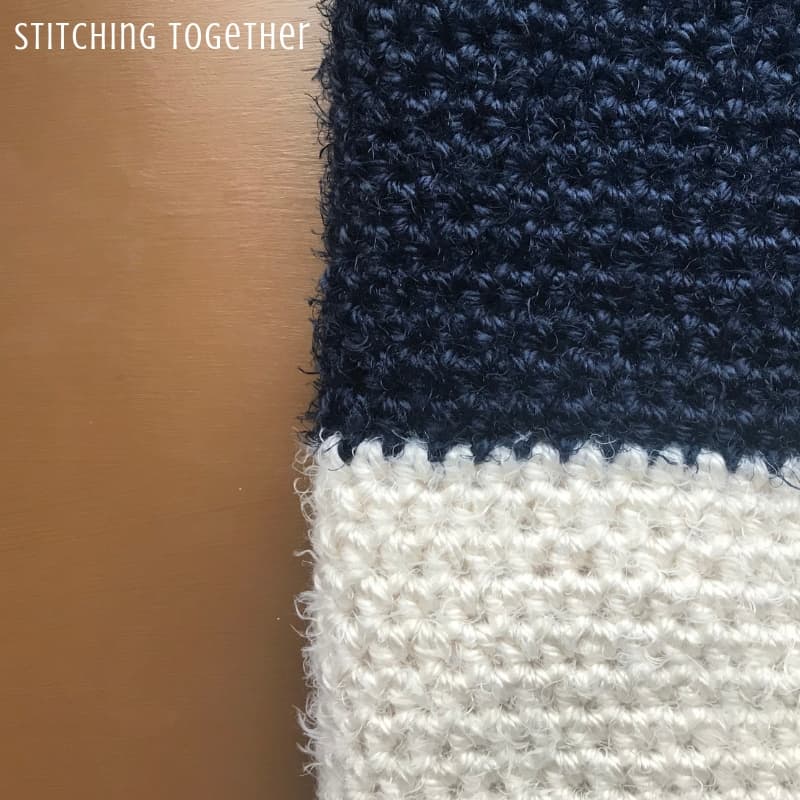 close up of blue and white half double crochet stitches