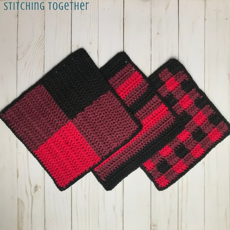 three crochet dishcloths in buffalo plaid, buffalo check, and stripes