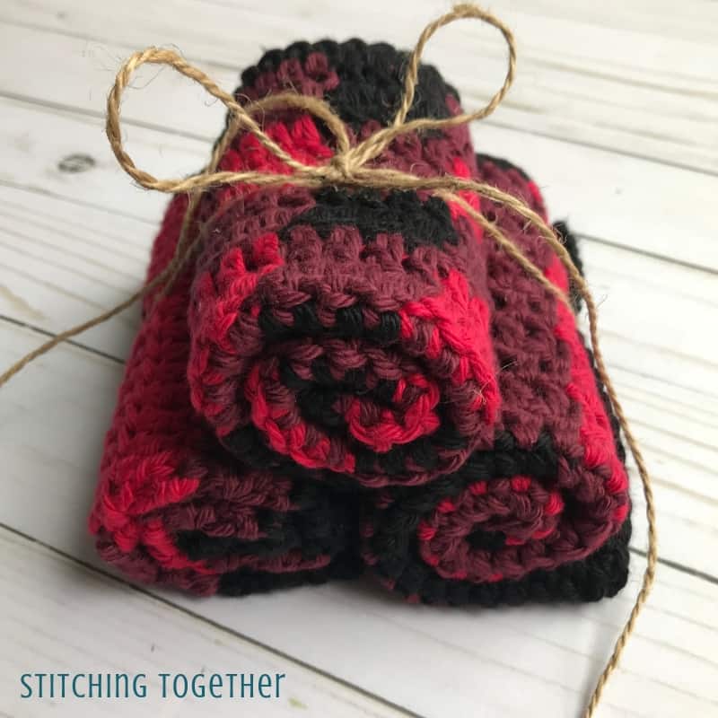 buffalo plaid crochet washcloths rolled and tied with string