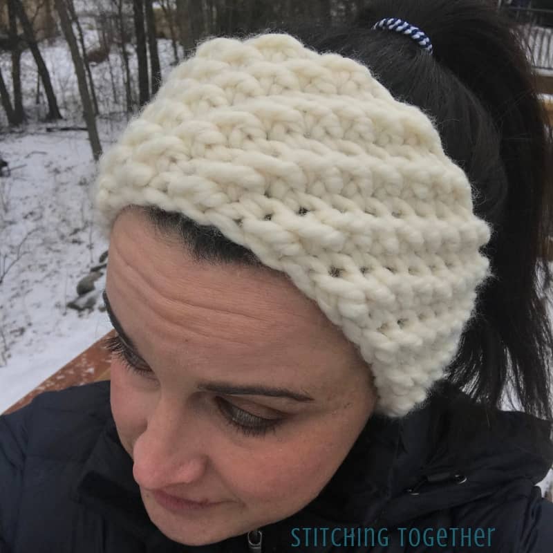 crochet winter headband being worn