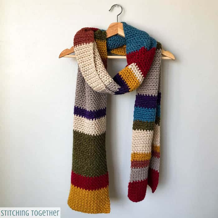 multicolored crochet scarf hanging