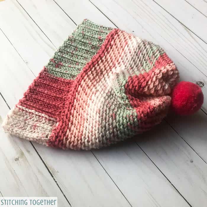 striped crochet hat with brim and pom pom