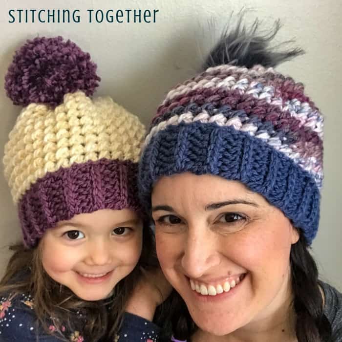 mom and daughter wearing textured crochet hats