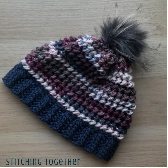 chunky crochet hat with faux fur pom pom