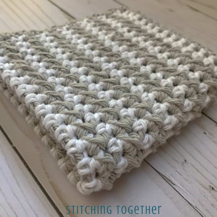 textured crochet dishcloth in gray and white