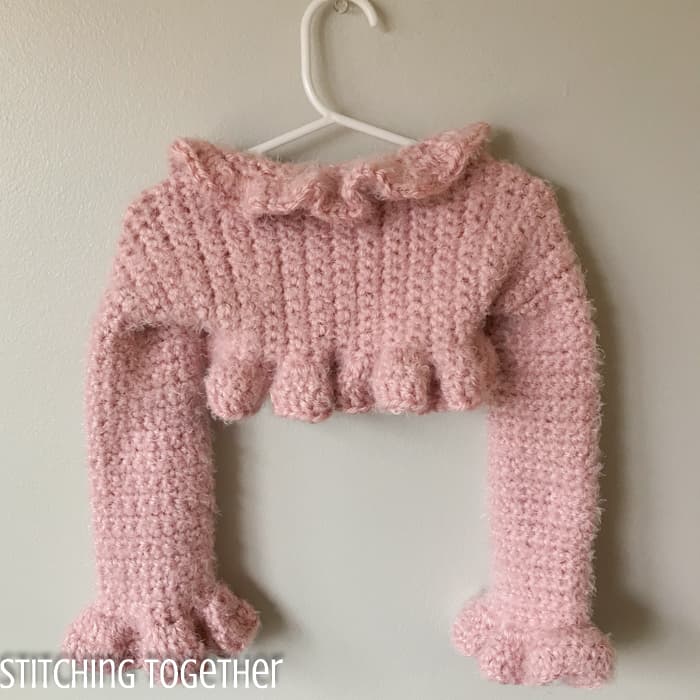 crochet bolero back view on hanger