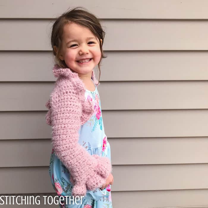 pink crochet bolero on girl