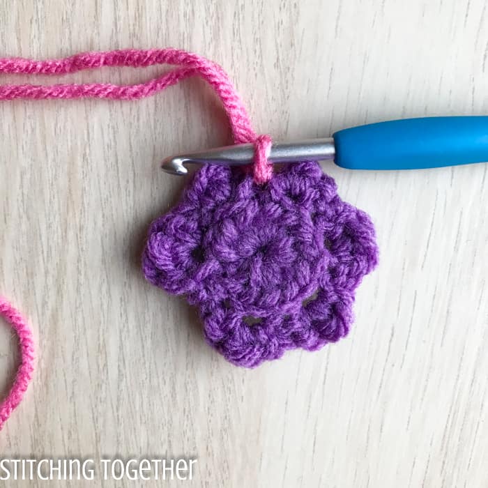 joining yarn on the backside of a crochet flower