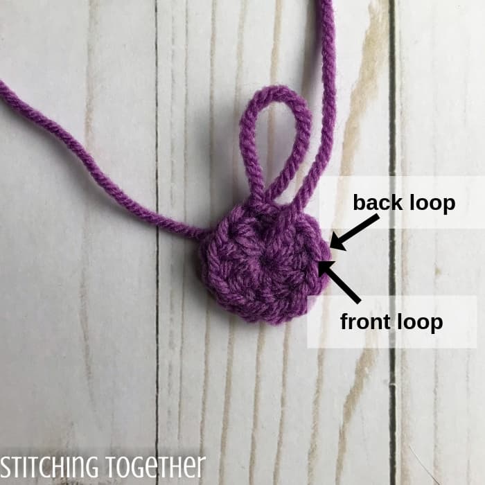 crochet ring with arrows showing front and back loops