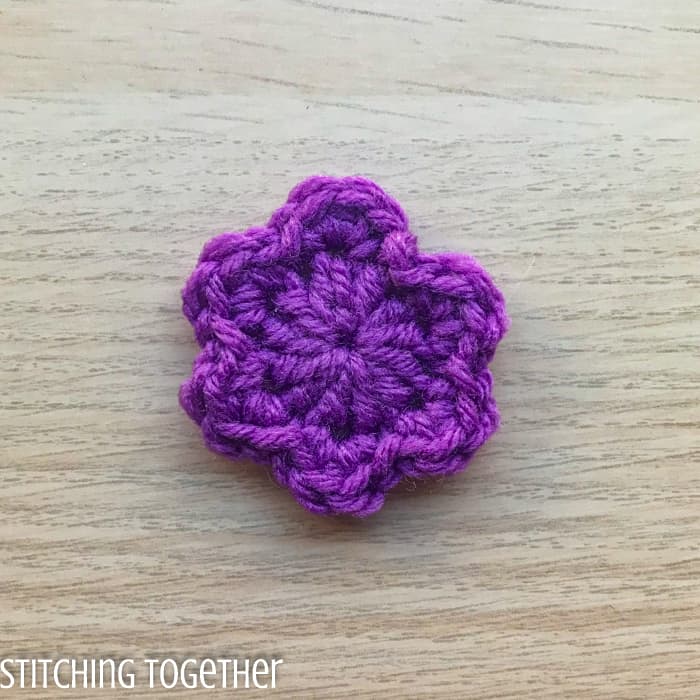 purple small crochet flower