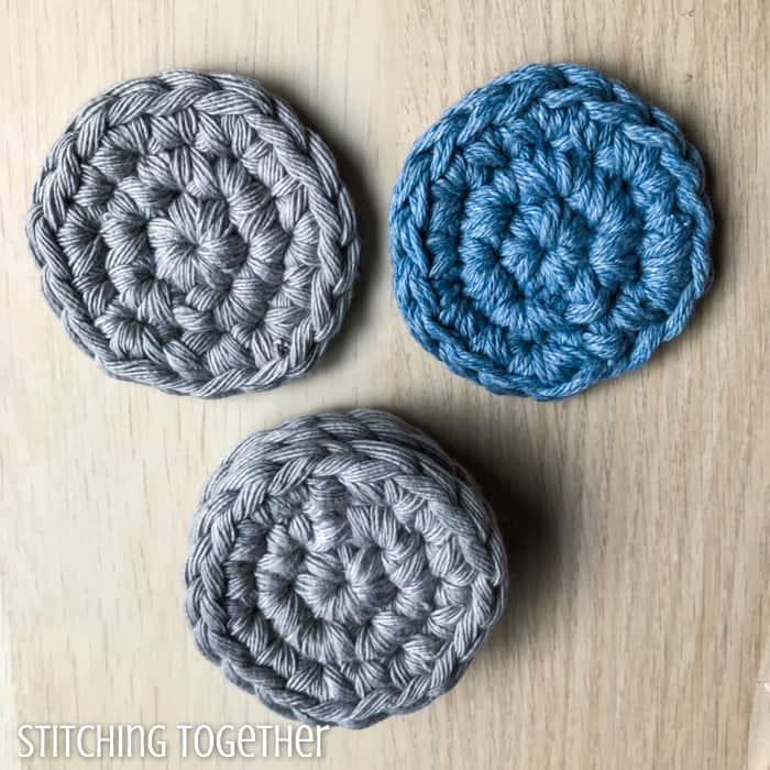 2 gray and 1 blue crochet dish scrubber