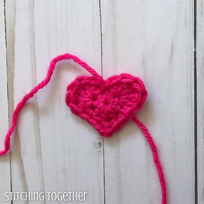 small crochet heart that with yarn ends 