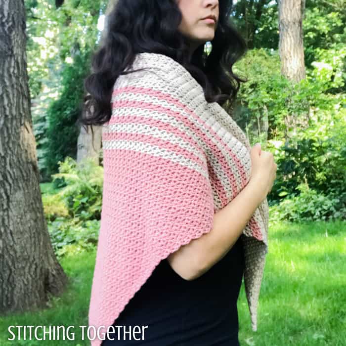 woman wearing triangle crochet shawl