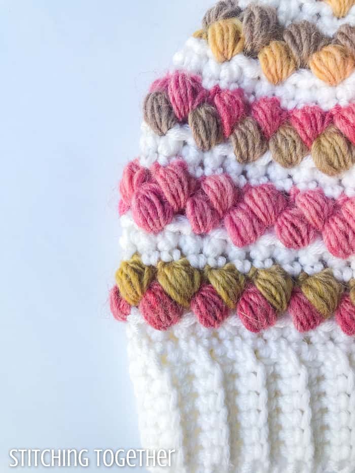 colorful puff stitches on crochet fabric