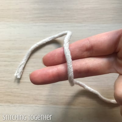 yarn across two fingers