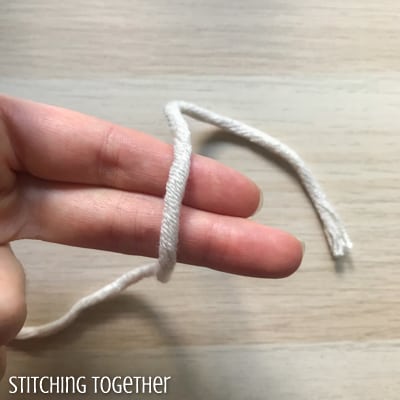 yarn across two fingers