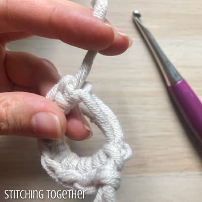 single crochets in a magic ring pulling tail end