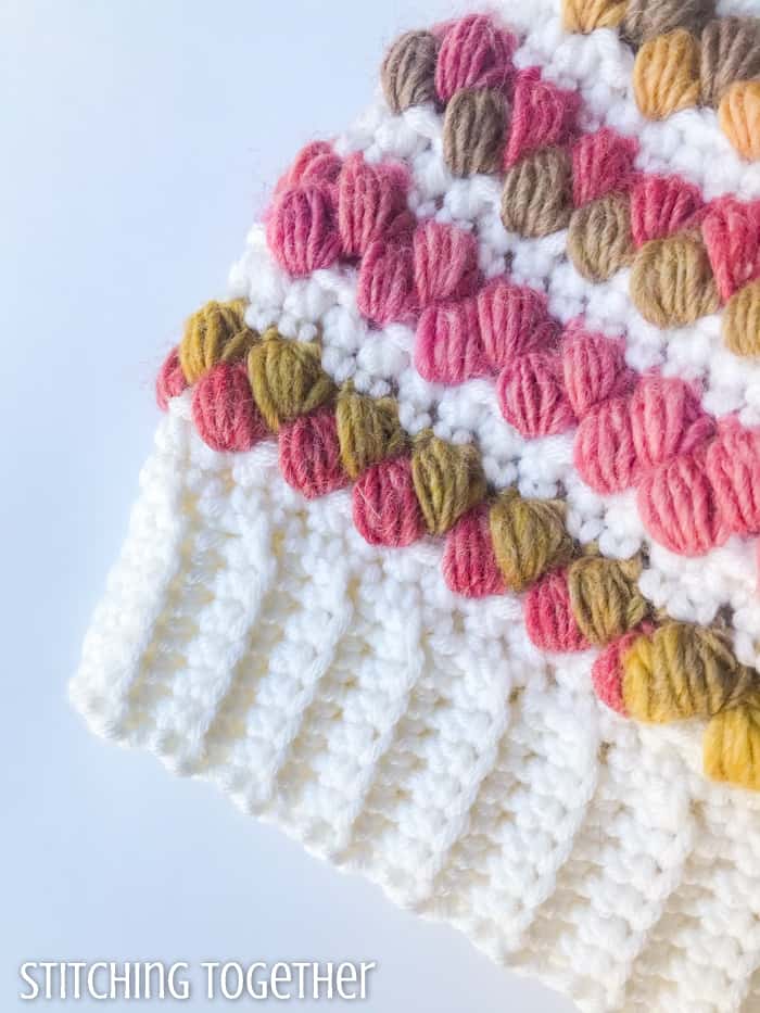 close up of crochet hat band with colorful puff stitches