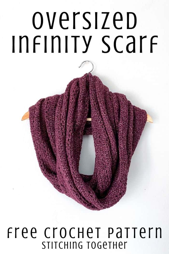 Oversized infinity scarf free crochet pattern pin image with scarf draped on a hanger