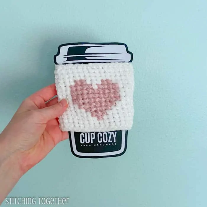 crochet coffee sleeve with pink heart